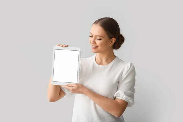 Beautiful Young Woman Holding Tablet Computer Blank Screen Grey Background — Stock Photo, Image