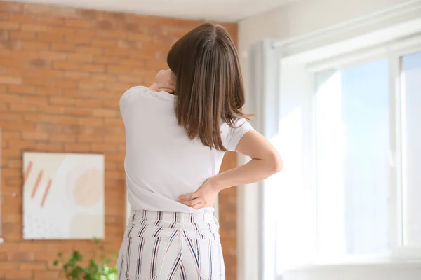 Young Woman Suffering Back Pain Home — Stock Photo, Image