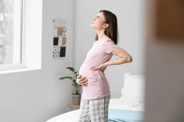 Young Pregnant Woman Suffering Back Pain Bedroom — Stock Photo, Image