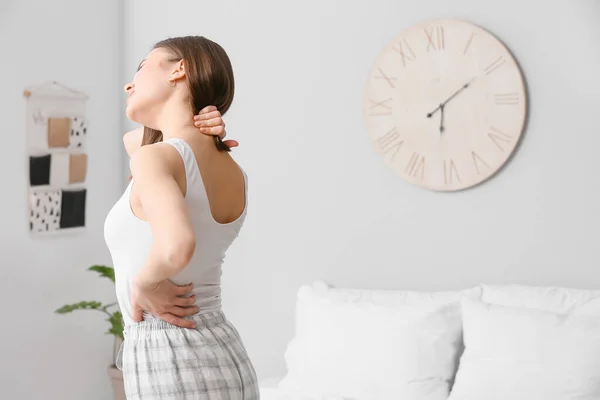 Young Woman Suffering Back Pain Bedroom — Stock Photo, Image