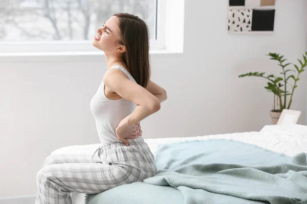 Young Woman Suffering Back Pain Bedroom — Stock Photo, Image