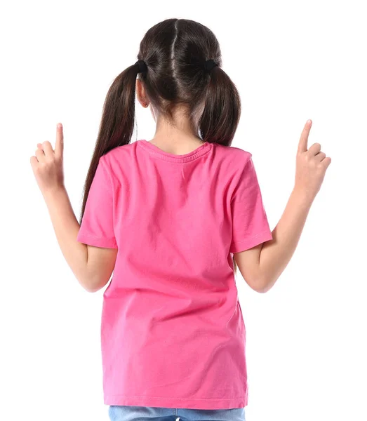 Niña Con Elegante Camiseta Apuntando Algo Sobre Fondo Blanco Vista — Foto de Stock