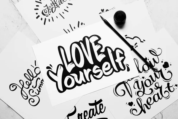 Text Love Yourself Brush Ink Paper Sheets — Stock Photo, Image