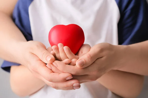 Woman Child Holding Red Heart Hands Closeup Cardiology Concept — Stock Photo, Image