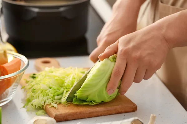 Young Woman Cutting Cabbage Delicious Borscht Wooden Board Kitchen — Stock Photo, Image