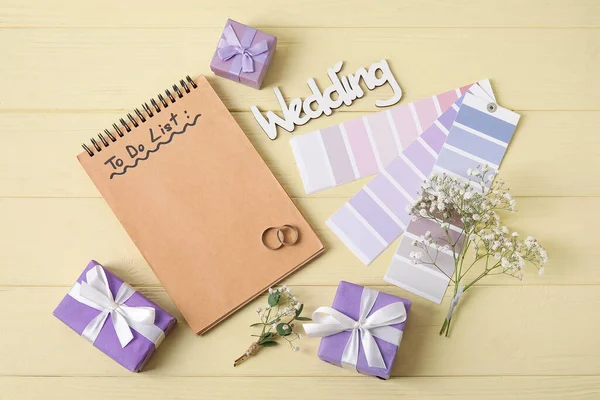 Composition Wedding Rings Color Samples Notebook Text List Yellow Wooden — Stock Photo, Image