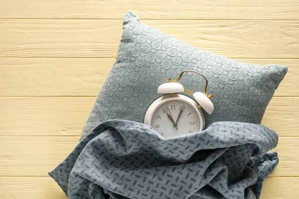 https://st2.depositphotos.com/10614052/50582/i/600/depositphotos_505826120-stock-photo-alarm-clock-with-pillow-and.jpg