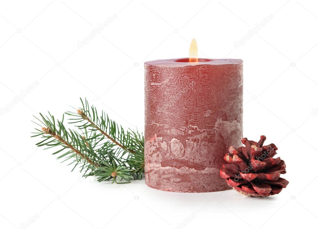 Composition with wax candle, fir branch and pine cones on white background