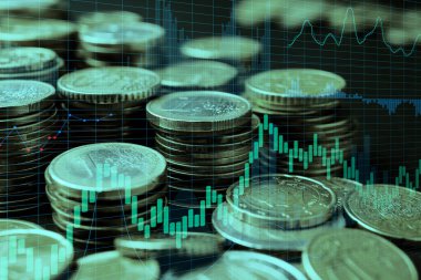 Sanal ekranda altın para ve grafiklerin çifte pozlandırılması