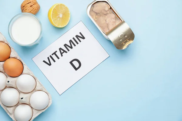 Text Vitamin Och Olika Hälsosamma Produkter Blå Bakgrund — Stockfoto