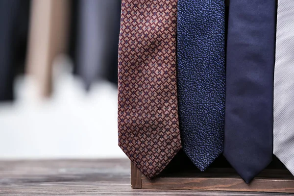 Stand Stylish Neckties Table Closeup — Stock Photo, Image