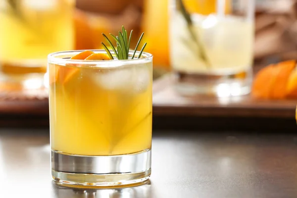 Glass Tasty Orange Cocktail Rosemary Table Closeup — Stock Photo, Image