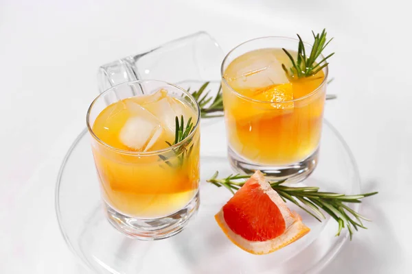 Glasses Tasty Grapefruit Cocktail Rosemary White Background — Stock Photo, Image