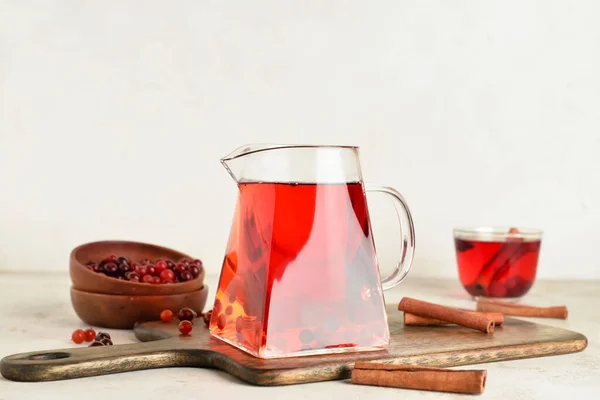 Jug Tasty Tea Cranberry Light Background — Stock Photo, Image