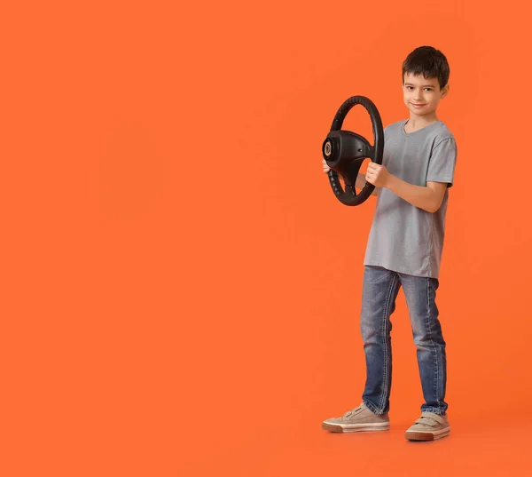 Little Boy Steering Wheel Color Background — Stock Photo, Image