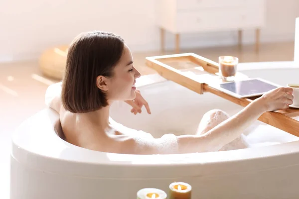 Young Woman Drinking Coffee While Taking Bath Home — Stock Photo, Image
