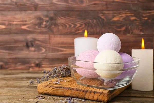 Bowl Lavender Bath Bombs Burning Candles Wooden Background — Stock Photo, Image