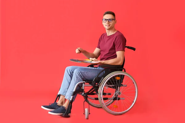 Young Male Artist Wheelchair Color Background — Stock Photo, Image