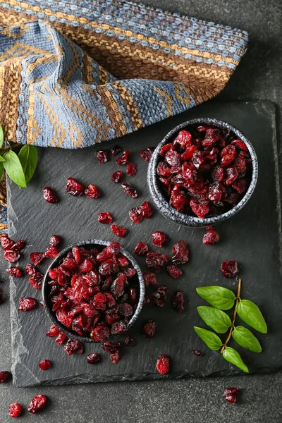 Bowls Tasty Dried Cranberries Dark Background — Stock Photo, Image