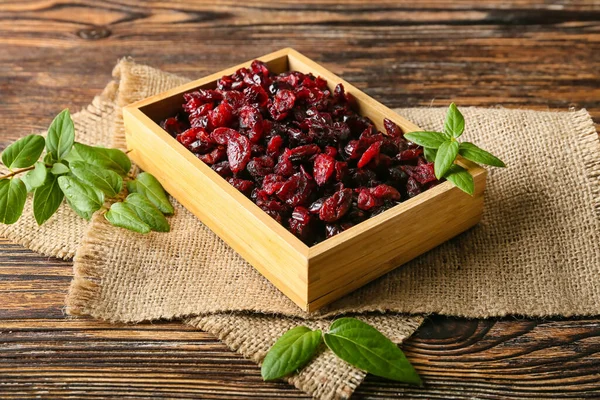 Box Tasty Dried Cranberries Wooden Background — Stock Photo, Image