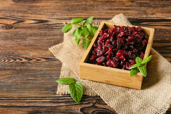 Box Tasty Dried Cranberries Wooden Background — Stock Photo, Image
