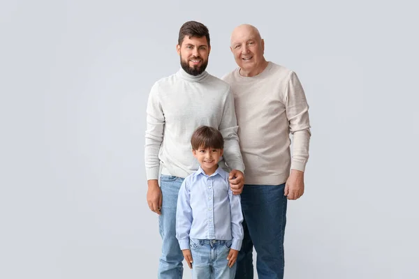 Feliz Hombre Pequeño Hijo Padre Sobre Fondo Claro — Foto de Stock