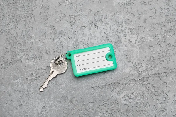 Key Plastic Tag Grunge Background — Stock Photo, Image