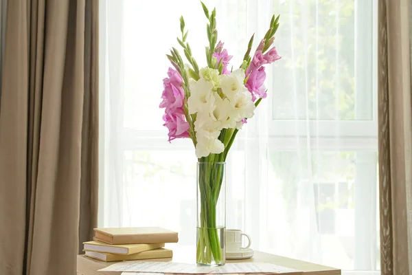 Vase Beautiful Gladiolus Flowers Books Cup Coffee Table Window — Stock Photo, Image