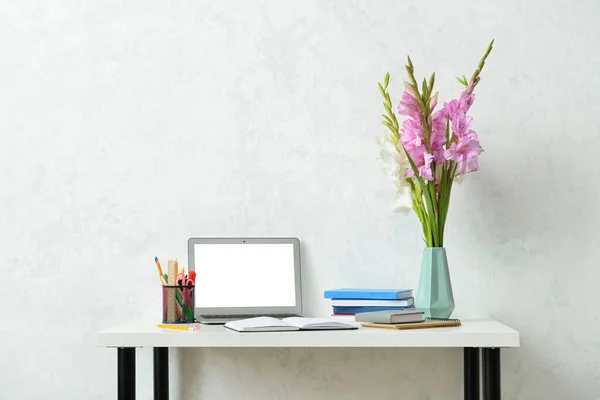 Vase Beautiful Gladiolus Flowers Modern Laptop Books Stationery Table Light — Stock Photo, Image