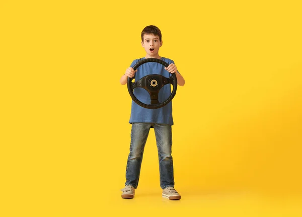 Shocked Little Boy Steering Wheel Color Background — Stock Photo, Image