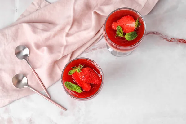 Glasses Tasty Strawberry Panna Cotta Mint Light Background — Stock Photo, Image