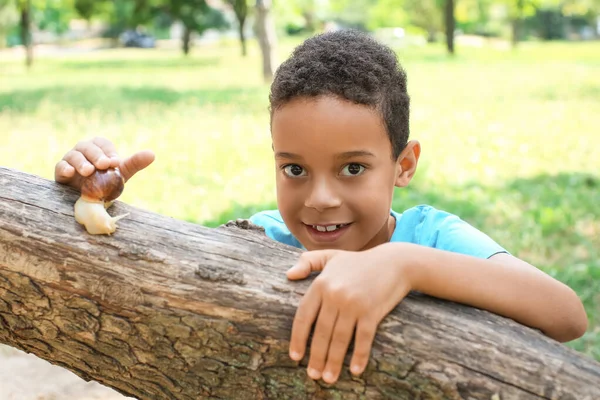 Little African American Boy Snail Outdoors — Stock Photo, Image