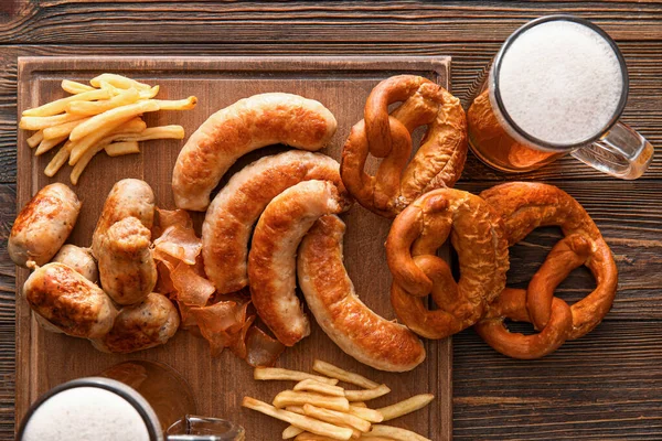 Mugs Cold Beer Board Bavarian Sausages Snacks Wooden Background Oktoberfest — Stock Photo, Image