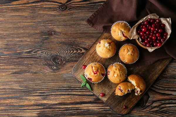 Board Tasty Cranberry Muffins Wooden Background — Stock Photo, Image