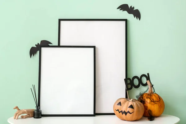 Blank Frames Halloween Decorations Shelf Green Wall — Stock Photo, Image