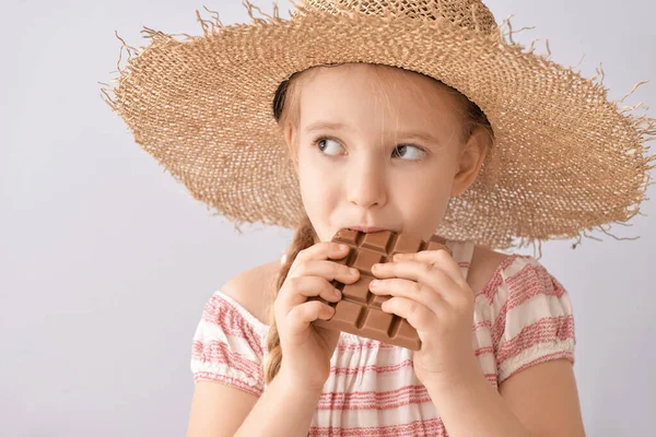 Cute Little Girl Eating Chocolate Light Background Closeup — Stock Photo, Image