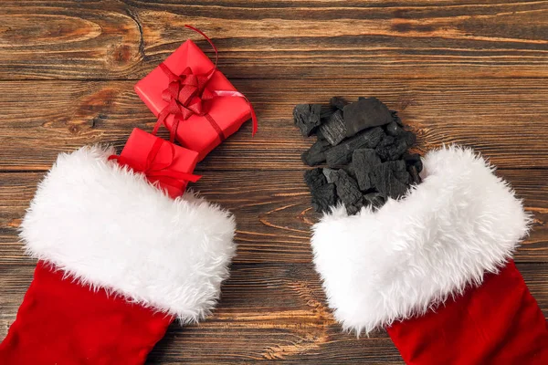 Christmas Socks Coal Gift Boxes Wooden Background — Stock Photo, Image