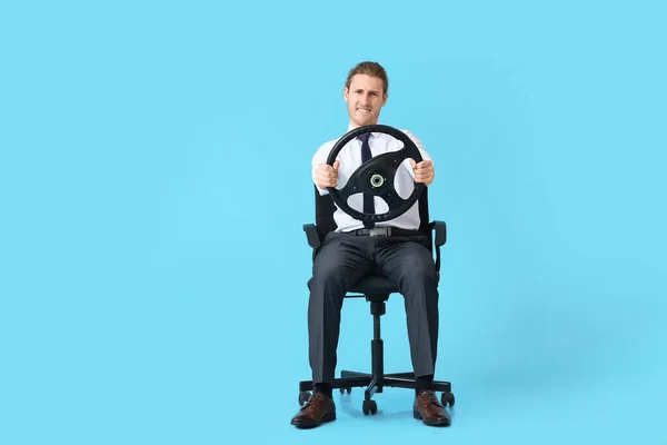 Young Man Steering Wheel Sitting Chair Color Background — Stock Photo, Image
