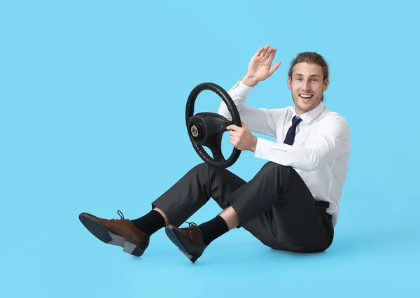 Young Man Steering Wheel Waving Hand Color Background — Stock Photo, Image