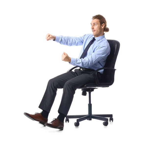 Jovem Com Volante Imaginário Sentado Cadeira Contra Fundo Branco — Fotografia de Stock
