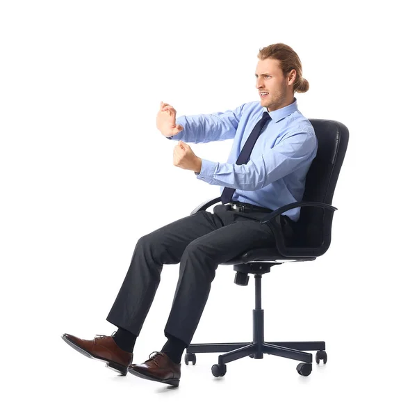 Displeased Young Man Imaginary Steering Wheel Sitting Chair White Background — Stock Photo, Image