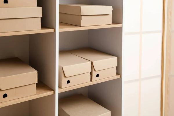 Many Cardboard Boxes Shelves Wardrobe — Stock Photo, Image