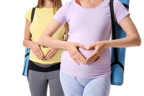Νεαρές Έγκυες Γυναίκες Στρώματα Γιόγκα Λευκό Φόντο Κοντινό Πλάνο — Φωτογραφία Αρχείου