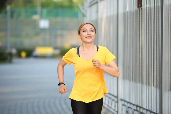 Sporty Mature Woman Running Outdoors — Stock Photo, Image