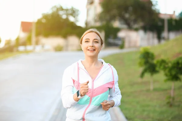 Sporty Mature Woman Running Outdoors — Stock Photo, Image