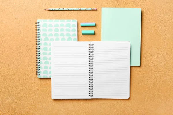 Different Notebooks Pencil Erasers Color Background — Stock Photo, Image