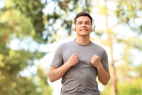 Sporty Young Man Headphones Running Park — Stock Photo, Image