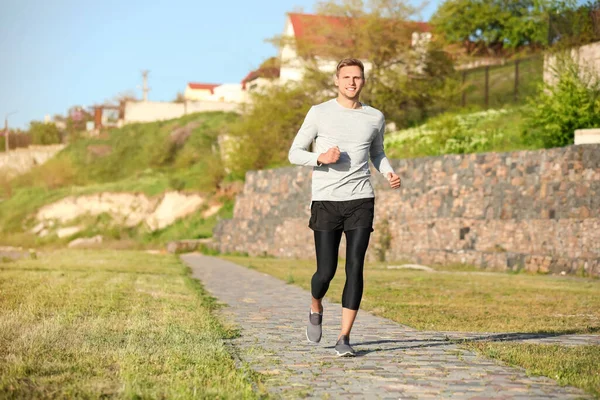 Sporty Young Man Jogging Park — Stock Photo, Image