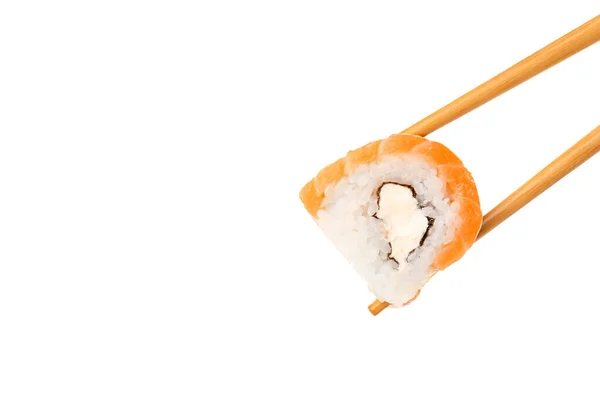 Chopsticks Tomando Delicioso Rolo Sushi Com Salmão Queijo Filadélfia Fundo — Fotografia de Stock