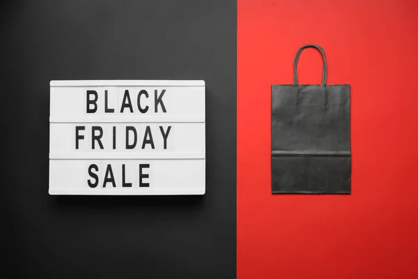 Board Text Black Friday Sale Shopping Bag Dark Red Background — Stock Photo, Image